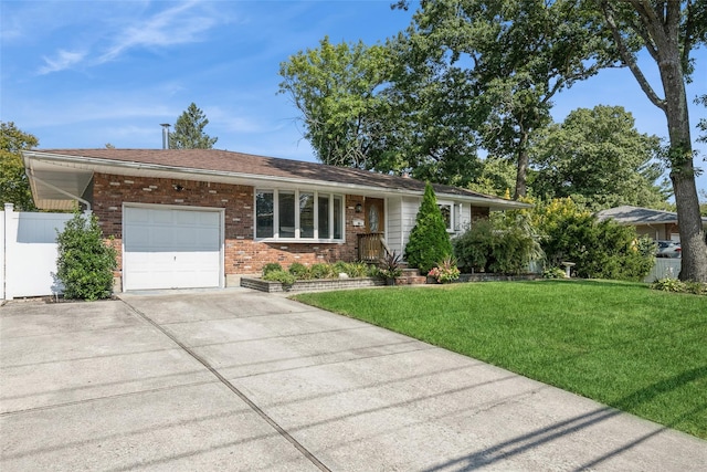 ranch-style house with a garage and a front lawn