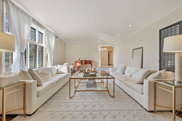 living room with ornamental molding