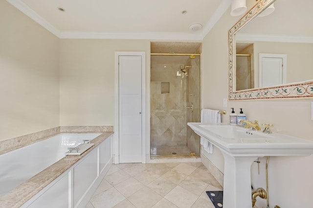 bathroom featuring crown molding, tile patterned floors, independent shower and bath, and sink