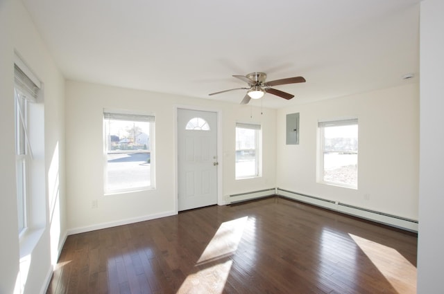 entrance foyer with plenty of natural light, dark wood-type flooring, and a baseboard radiator