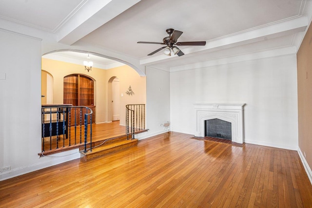 living room with ornamental molding, ceiling fan with notable chandelier, and hardwood / wood-style flooring