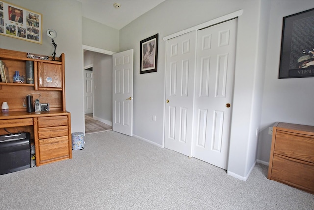 office area featuring light colored carpet