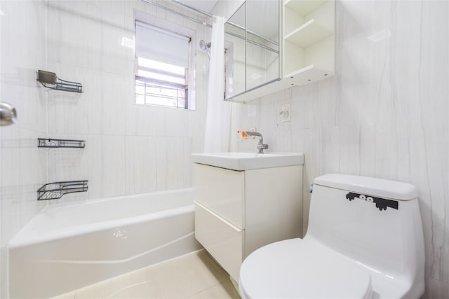 full bathroom featuring vanity, tile patterned flooring, toilet, shower / bath combo with shower curtain, and tile walls