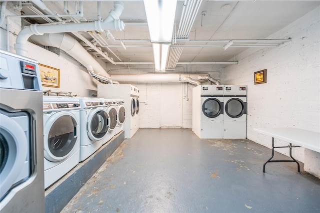 washroom with washing machine and dryer