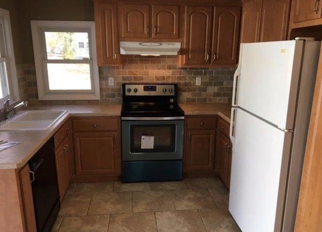 kitchen with sink, black dishwasher, electric range oven, white refrigerator, and extractor fan