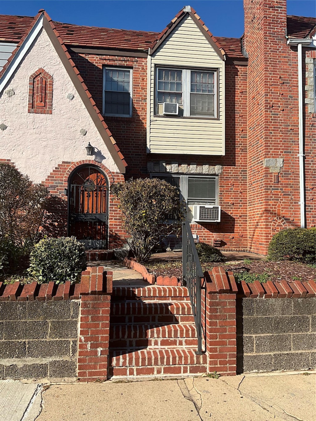 view of front of property with cooling unit