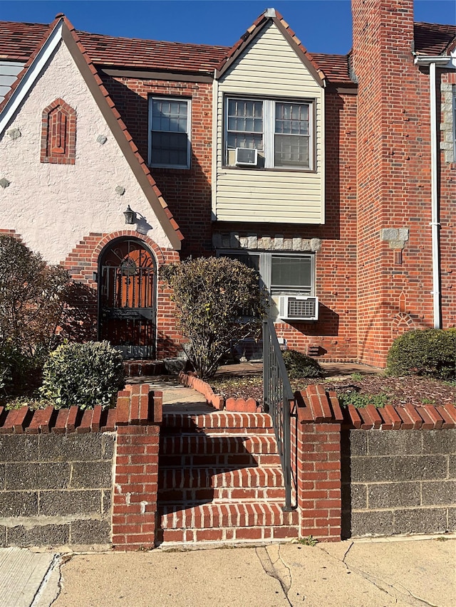 view of front of property with cooling unit