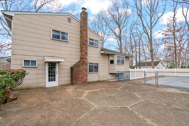 rear view of house featuring a patio area