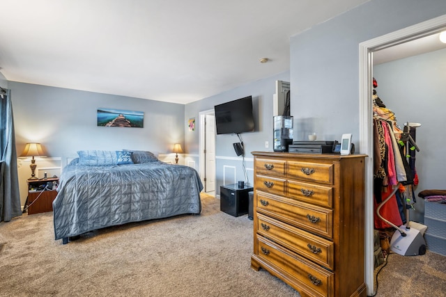 carpeted bedroom featuring a closet