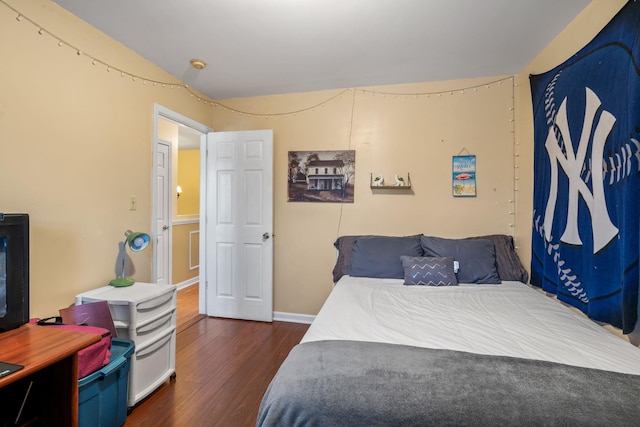 bedroom featuring dark hardwood / wood-style floors