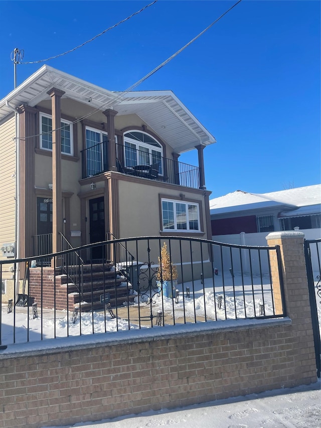 view of snow covered property