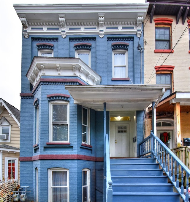 view of front of home with cooling unit