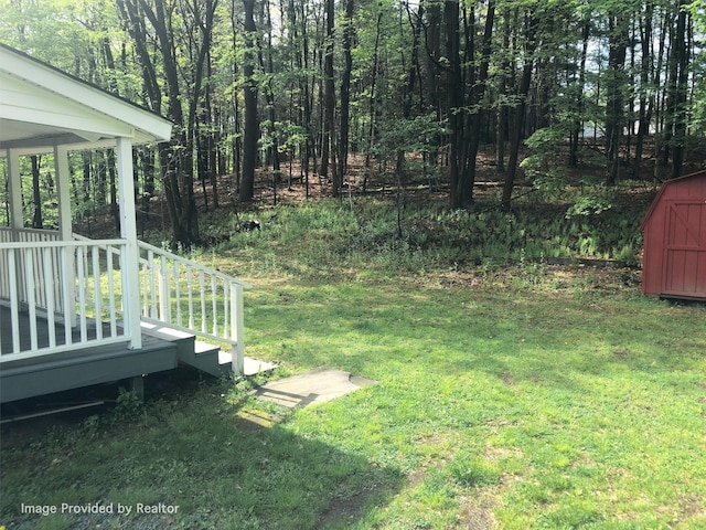 view of yard with a deck