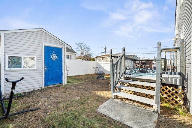 view of yard with a wooden deck