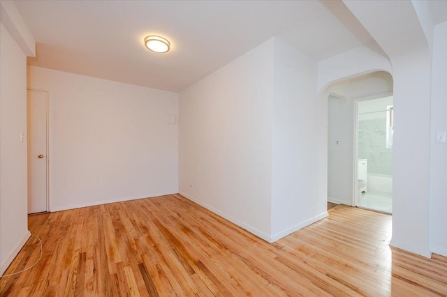 empty room featuring light hardwood / wood-style floors