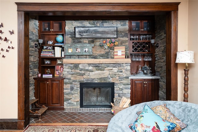 bar featuring a fireplace