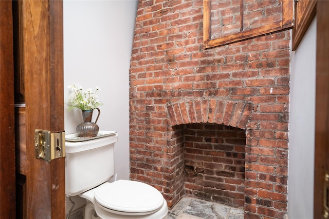 bathroom featuring toilet