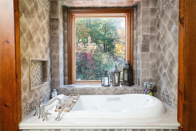 bathroom with tiled bath