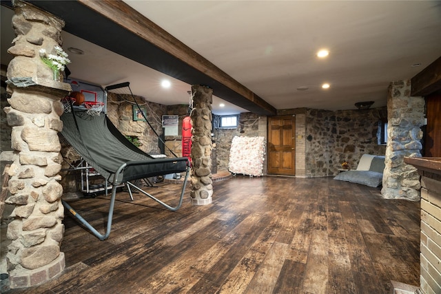 basement with dark wood-type flooring