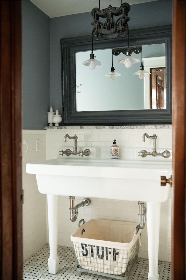bathroom featuring tile walls and wainscoting