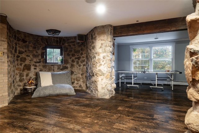 living area featuring baseboard heating and wood finished floors