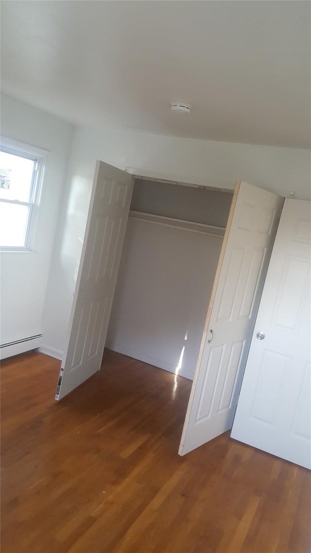 closet with a baseboard radiator