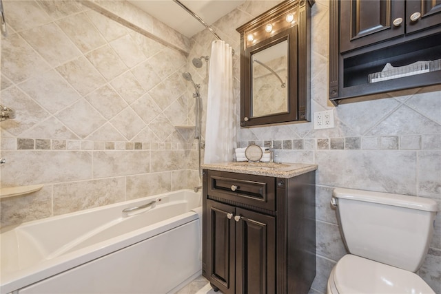 full bathroom with toilet, shower / bath combo with shower curtain, tile walls, and sink