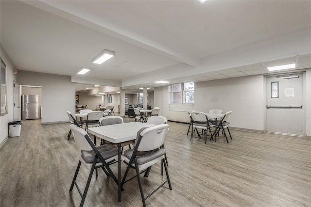 dining room with hardwood / wood-style flooring