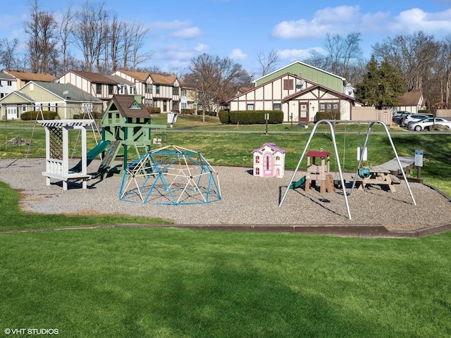 view of jungle gym with a lawn