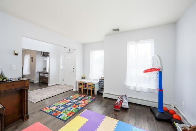 rec room with dark wood-type flooring