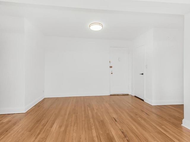 unfurnished room featuring light hardwood / wood-style floors