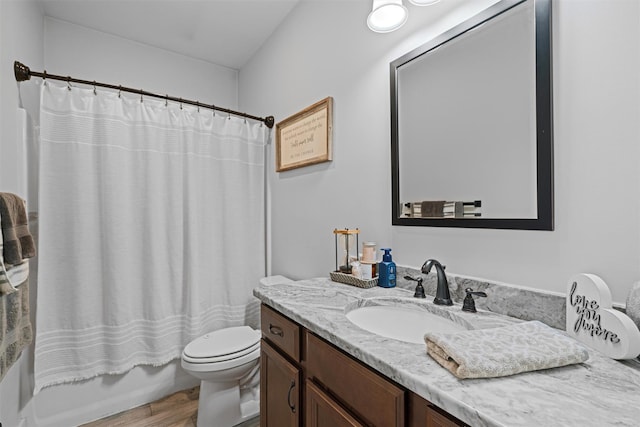 full bathroom with toilet, vanity, shower / bath combination with curtain, and hardwood / wood-style flooring