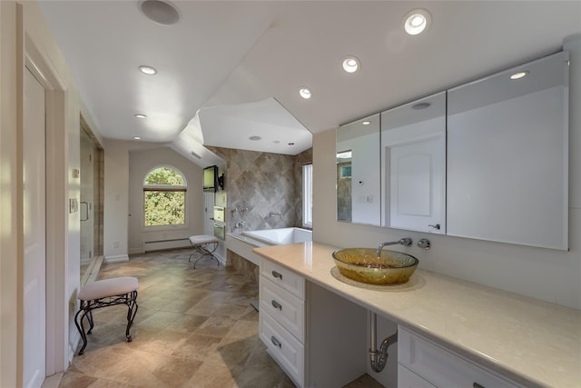 bathroom featuring tasteful backsplash, vanity, separate shower and tub, a baseboard heating unit, and lofted ceiling