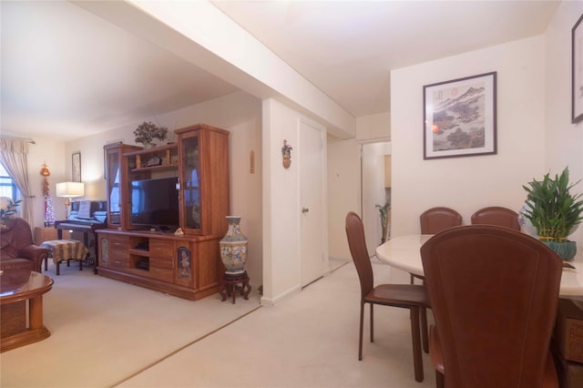 view of carpeted dining space