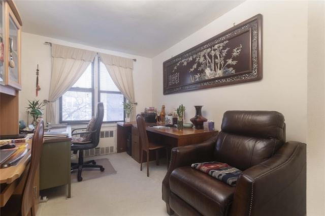 office area featuring light colored carpet and radiator heating unit