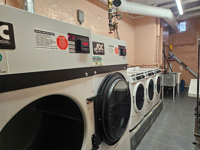 washroom featuring washer and dryer