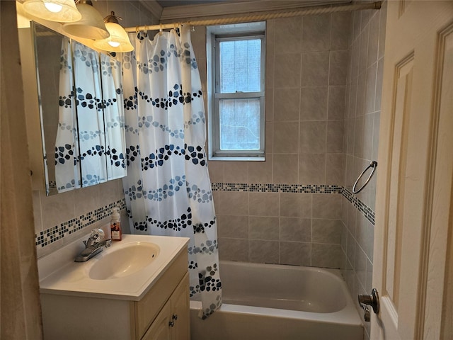 bathroom with vanity and shower / bath combination with curtain