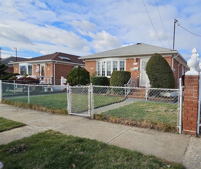 view of front of home with a front lawn