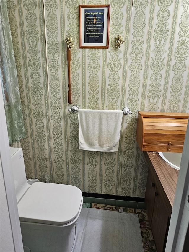 bathroom with vanity and toilet