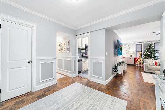 interior space featuring dark parquet floors and ornamental molding