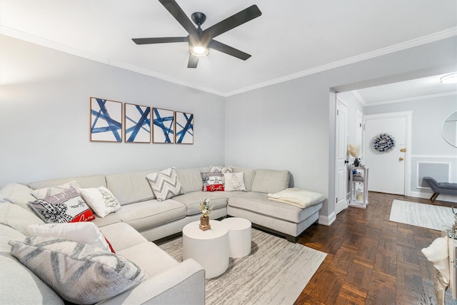 living room with ceiling fan, dark parquet flooring, and ornamental molding