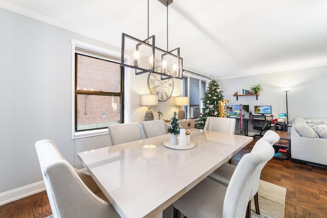 dining space with crown molding, dark wood-type flooring, and a notable chandelier