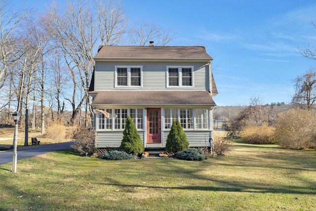 front facade with a front lawn