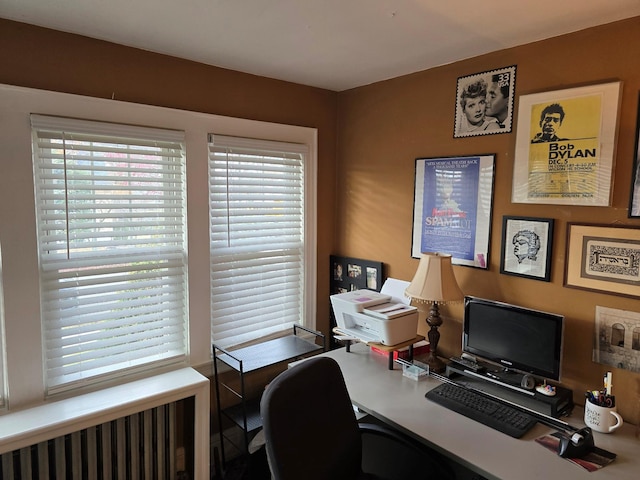 office area featuring radiator heating unit