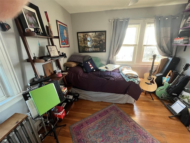 bedroom featuring hardwood / wood-style floors