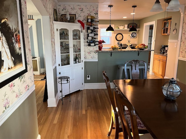 dining room featuring light hardwood / wood-style floors