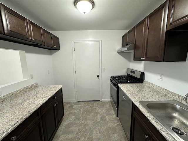 kitchen featuring dark brown cabinetry, stainless steel appliances, and sink