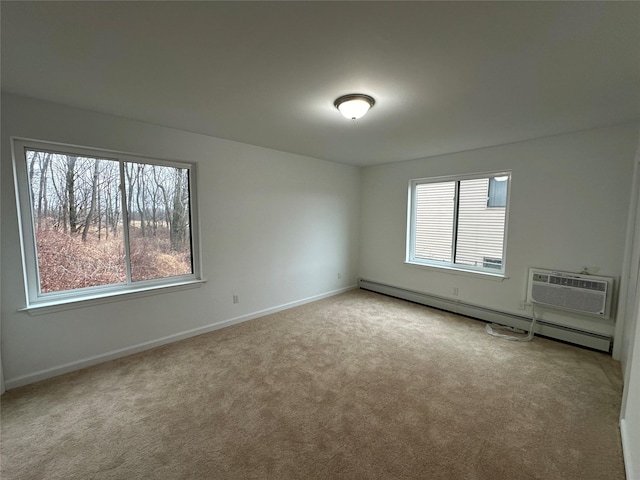 carpeted spare room featuring a wall unit AC, a wealth of natural light, and a baseboard heating unit