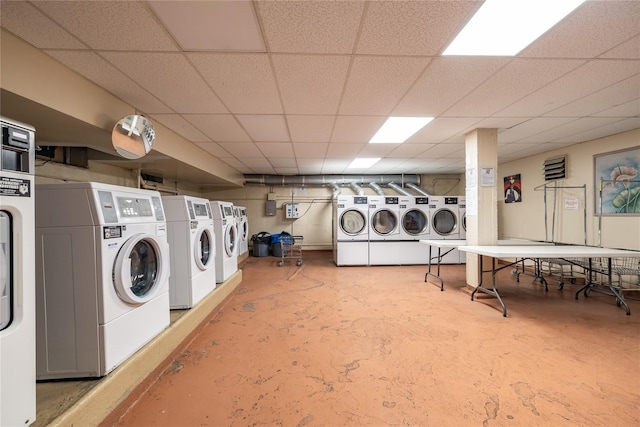 laundry area featuring washing machine and clothes dryer