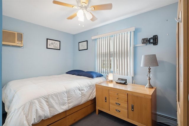 bedroom featuring ceiling fan, an AC wall unit, and baseboard heating